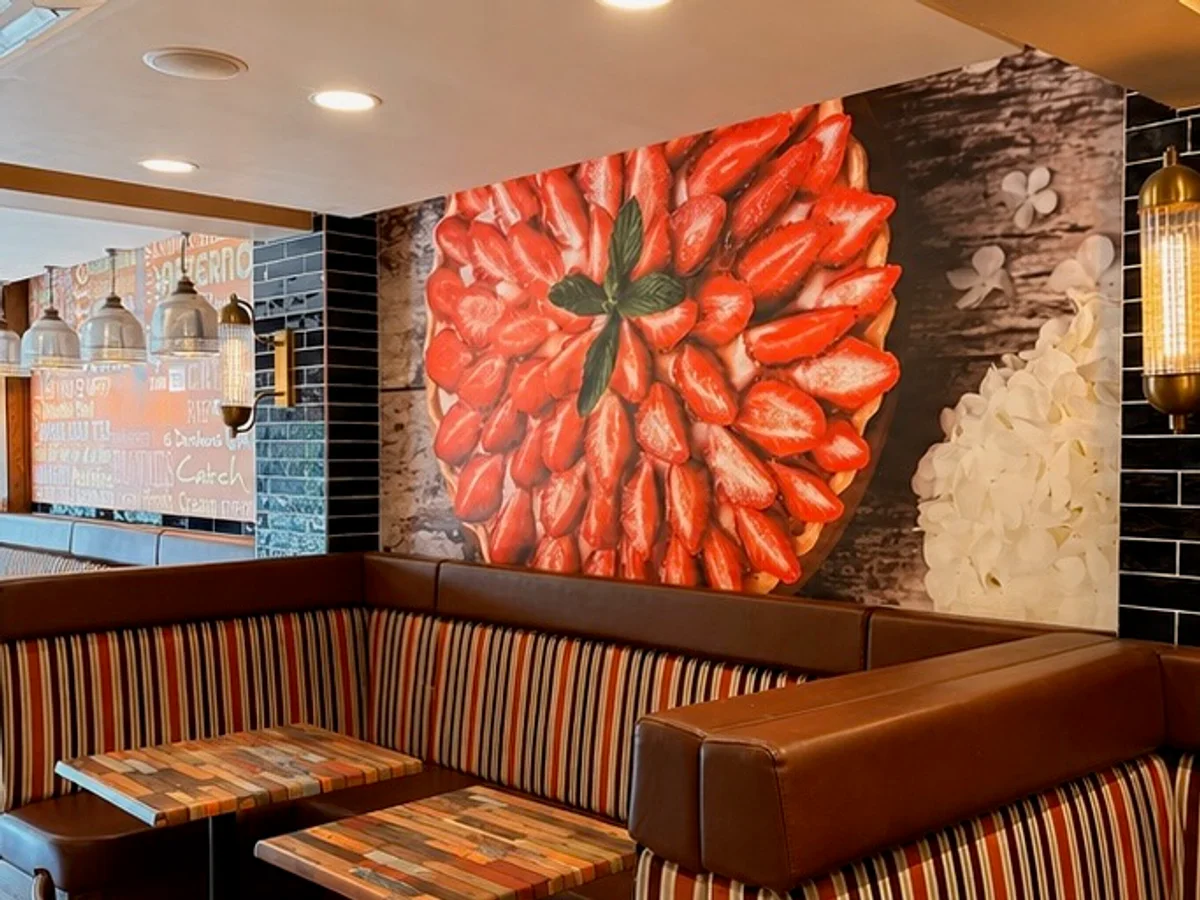 Booth seating inside Wedges Bakery on Dovehouse Parade, Solihull