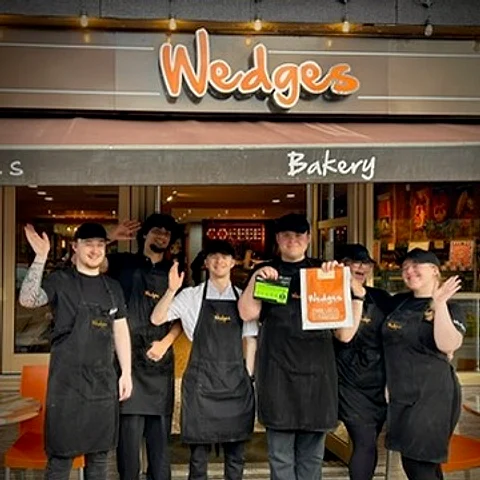 The Wedges team outside the Dovehouse Parade shop in Solihull